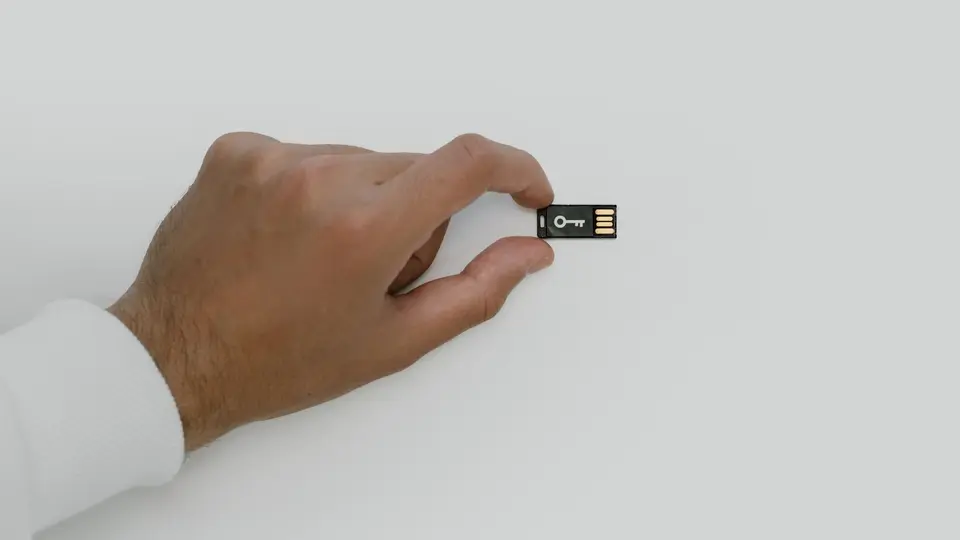 Digital padlock hologram glowing on glowing fiber optic circuit board