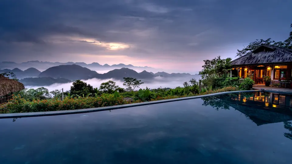 Split comparison between expensive Western rent bills and low-cost tropical villa living