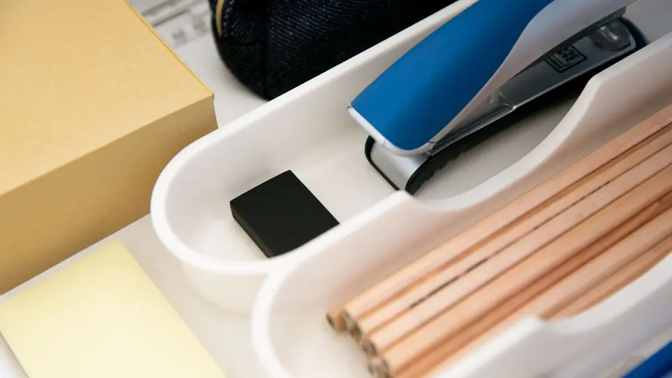 Drawer organizer with neatly aligned cables and single all-in-one charging station