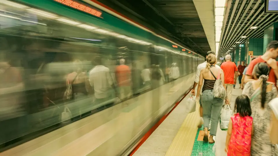 Crowded subway train during Monday morning rush hour commute with tired commuters