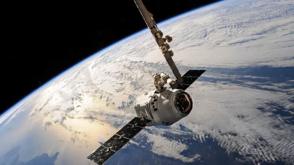 Robotic mining probe tethered to rocky asteroid core extracting rare earth minerals