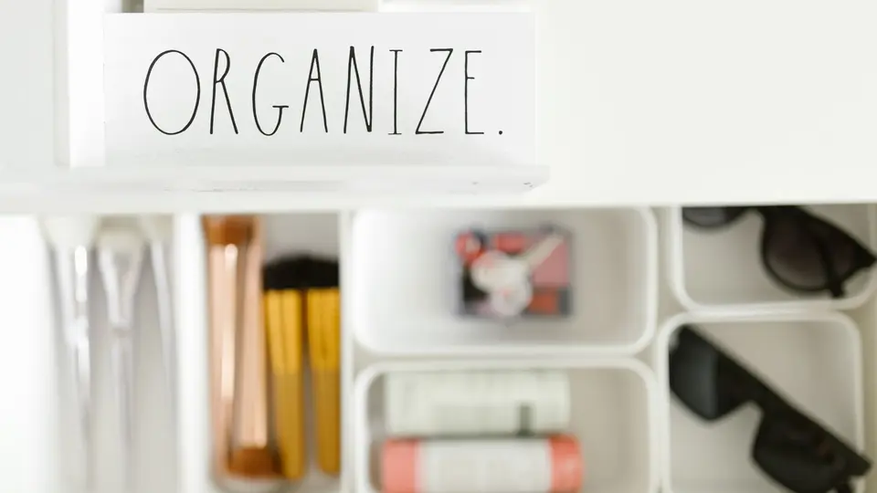 Drawer organizer with neatly aligned cables and single all-in-one charging station