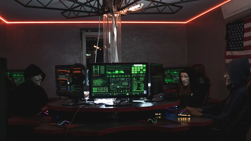 Massive command center showing cybersecurity incident response team containing a network breach